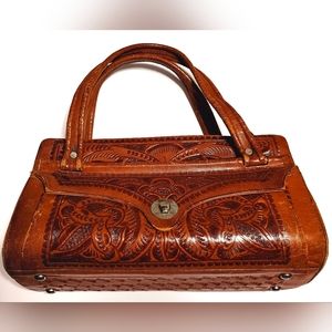 Vintage tooled handbag